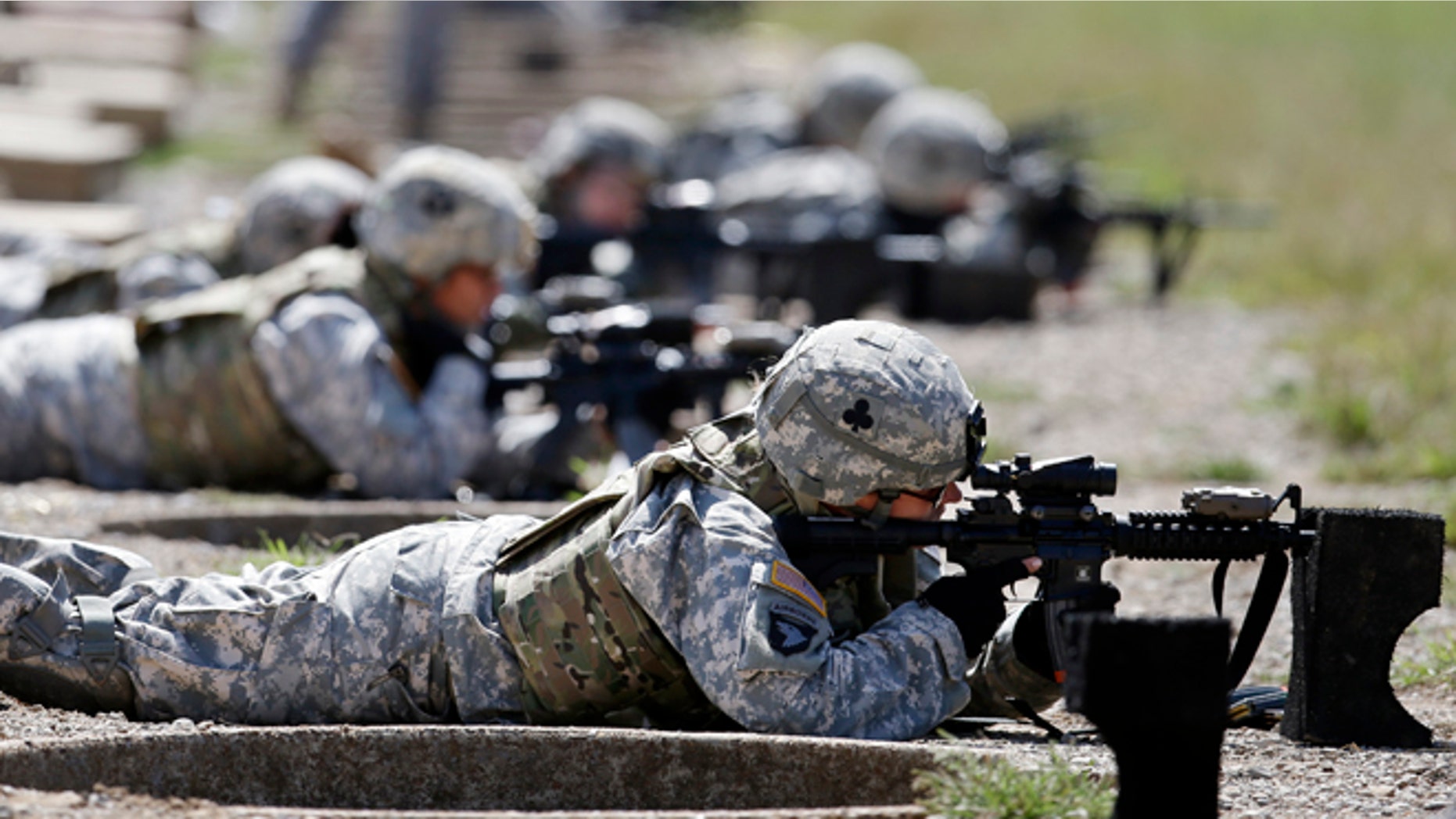 Sept. 18, 2012: Female soldiers from 1st Brigade Combat Team, 101st Airborne Division train on a firing range while testing new body armor in Fort Campbell, Ky., in preparation for their deployment to Afghanistan.