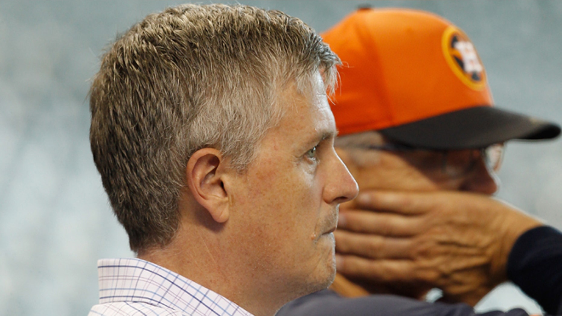 Houston Astros general manager Jeff Luhnow, who was raised in Mexico City, looks on during batting practice before a game between the Los Angeles Angels of Anaheim and Houston Astros at Minute Maid Park on September 3, 2014 in Houston, Texas. (Photo by Bob Levey/Getty Images)