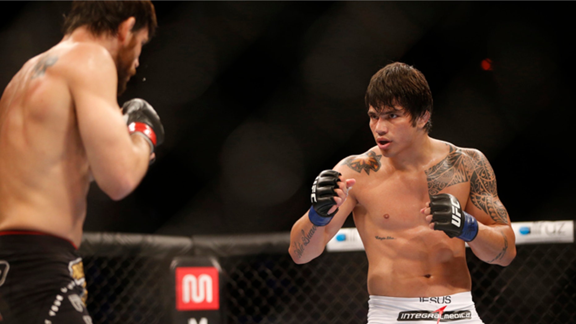 Oct.14, 2012: In this file photo, Erick Silva, right, from Brazil, fights Jon Fitch, left, from the United States, during their welterweight mixed martial arts bout at the Ultimate Fighting Championship (UFC) 153 in Rio de Janeiro, Brazil.