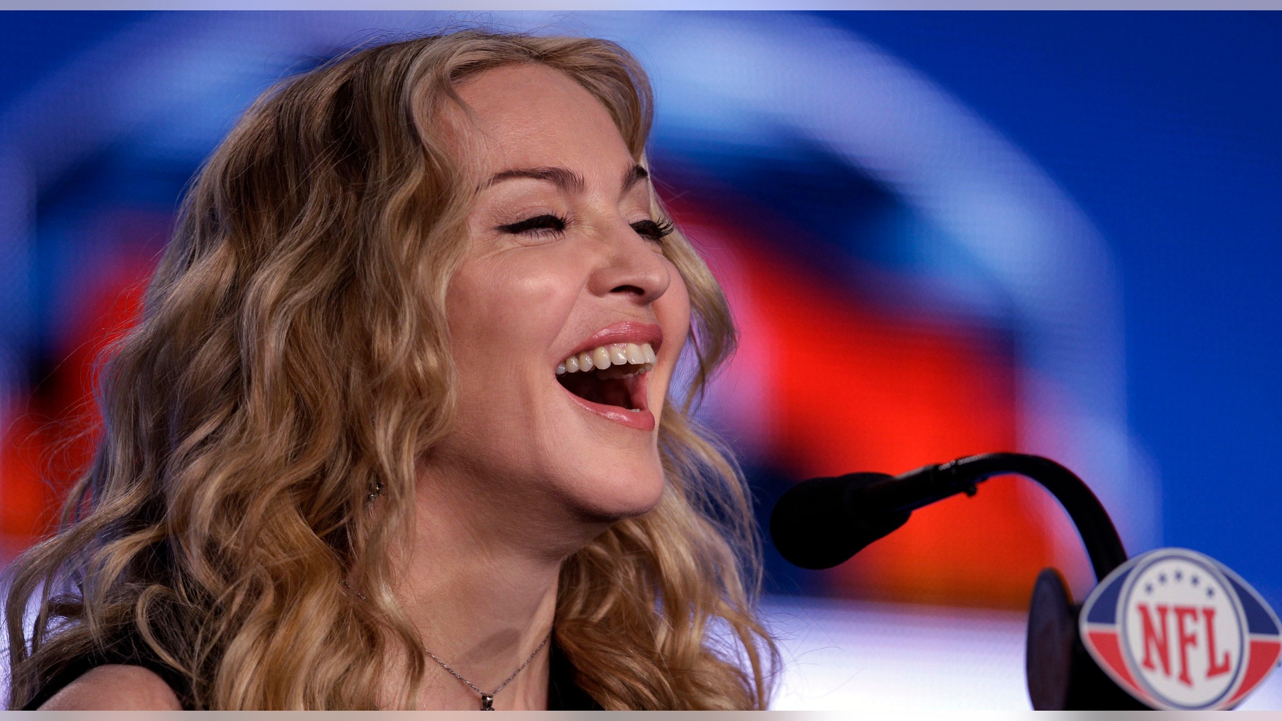 Madonna speaks during a news conference for NFL footbal's Super Bowl XLVI's halftime show Thursday, Feb. 2, 2012, in Indianapolis. (AP Photo/Matt Slocum)