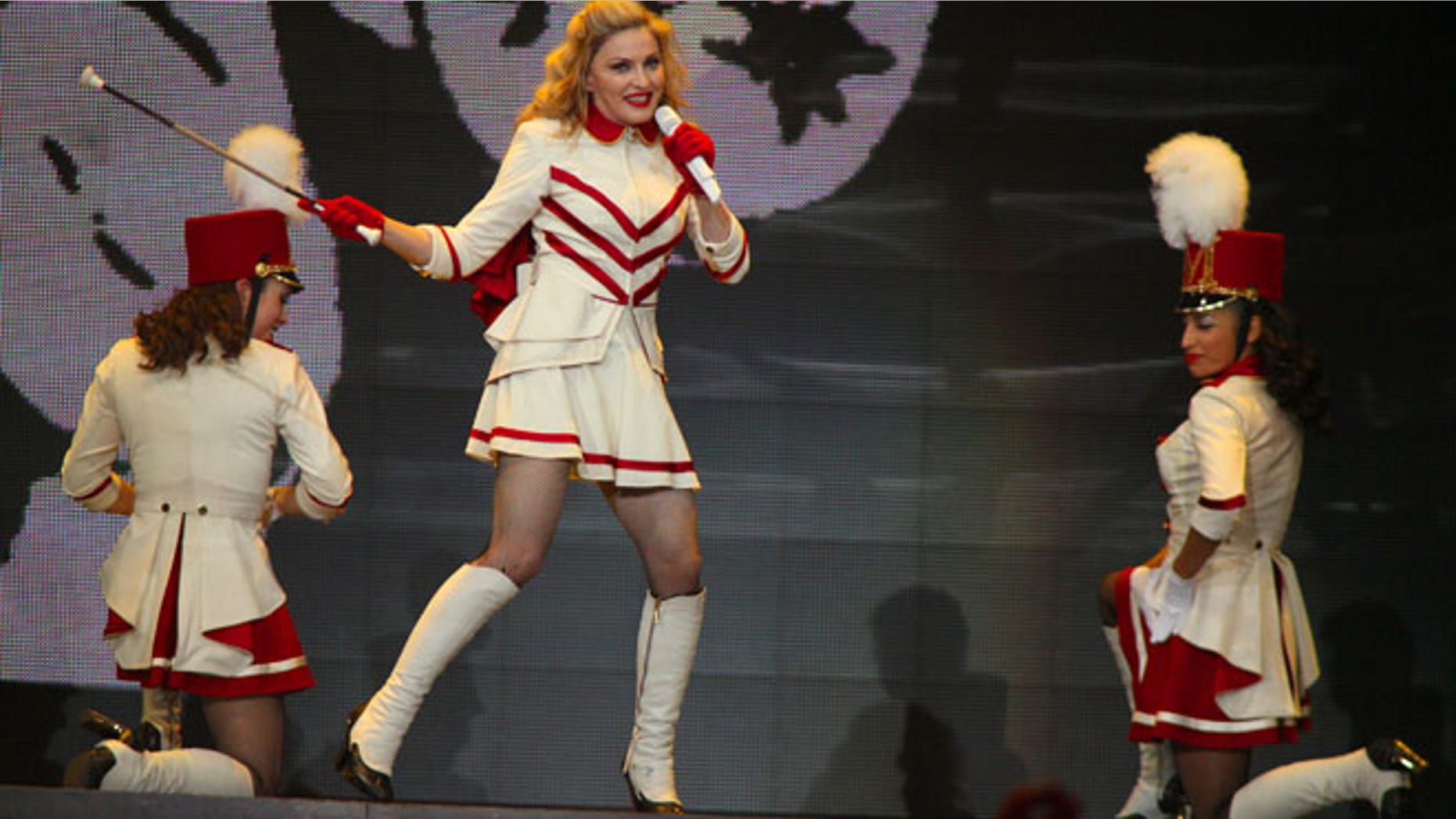 Madonna, shown here at the United Center in Chicago on Sept. 19, offered to strip to win votes for Obama during a concert at Washington's Verizon center.