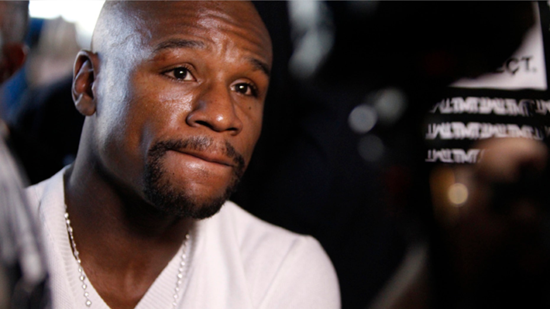 Floyd Mayweather arrives at an event to promote his Saturday title boxing bout against Marcos Maidana, in Las Vegas on Tuesday, Sept. 9, 2014. (AP Photo/Las Vegas Review-Journal, Erik Verduzco)