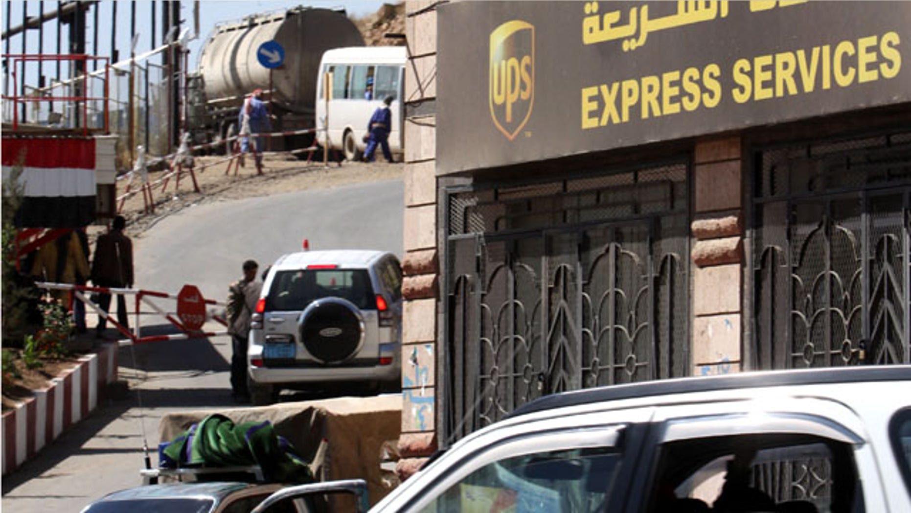 Nov. 2: Policemen guard UPS office in San'a, Yemen.