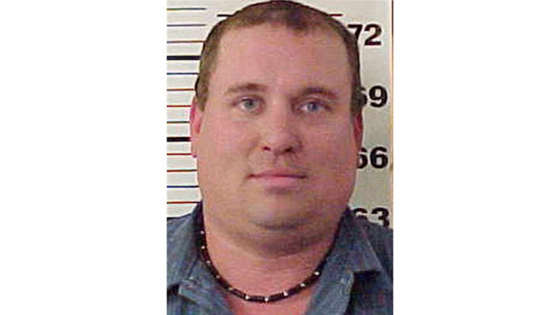 June 15, 2010: Booking photo provided by the Piscataquis County, Me., Sheriff's Office shows Steven Lake, after his arrest for threatening his wife and their two children the previous day.