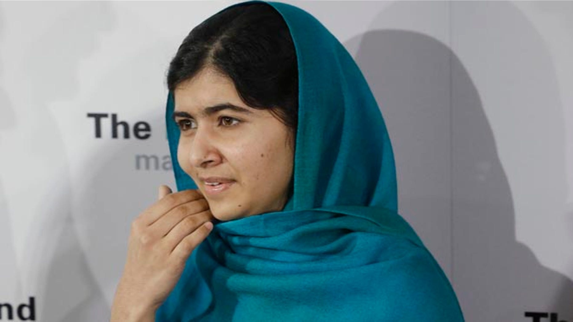 Oct. 10, 2013: Malala Yousafzai poses for photographs in New York. Yousafzai, was shot by the Taliban for her advocating education for girls.