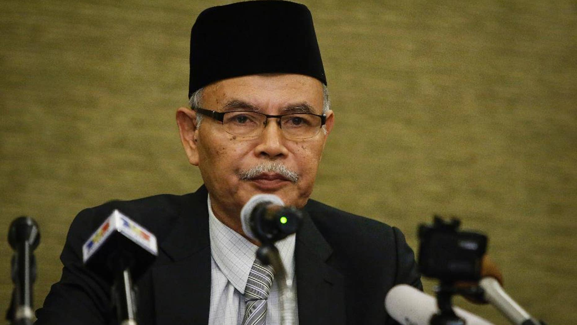 Patani Consultative Council chairman Awang Jabat speaks at a press conference in Kuala Lumpur, Malaysia, Thursday, Aug. 27, 2015. Muslim militant leaders in peace talks with Thai authorities to end a deadly insurgency said Thursday they are seeking an independent Islamic state in Thailand’s three southernmost provinces. Awang Jabat said the coalition wants the peace talks to be put on the national agenda to ensure continuity if a new government comes into power. The peace effort must be able to continue from where it stops, rather than having to start afresh again if the government changes, he said. (AP Photo/Joshua Paul)