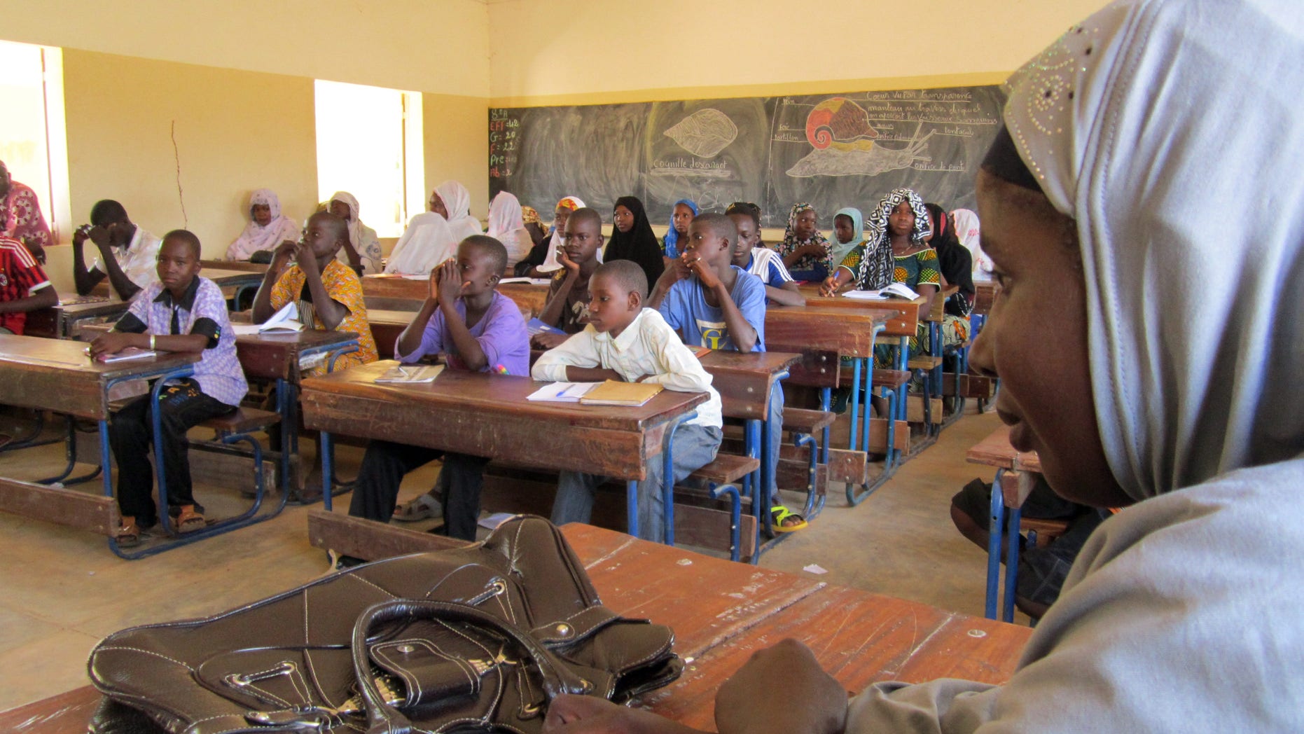 Sept. 27, 2012 - school children listen to a teacher during class in Douentza, Mali.