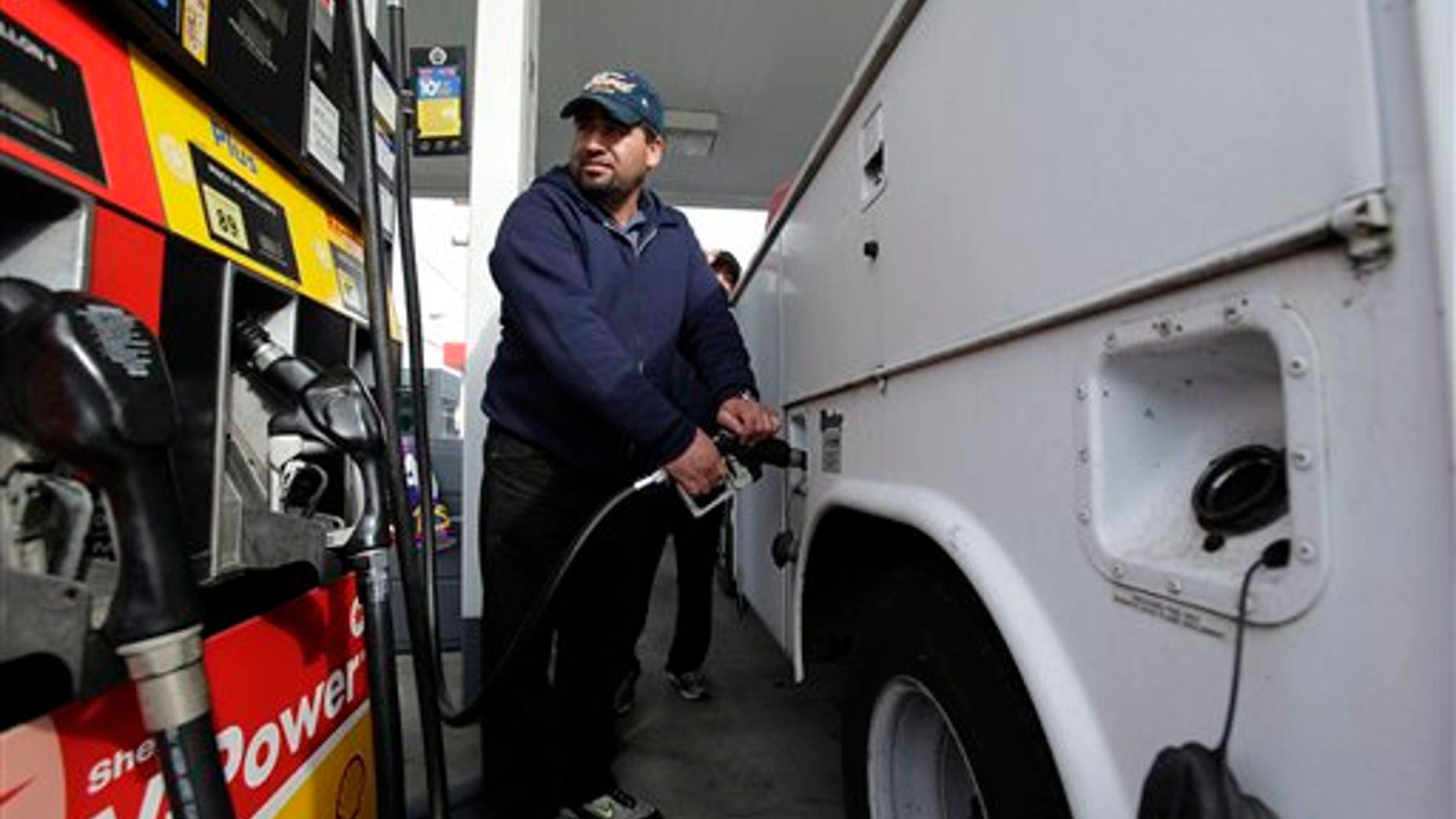 April 15: A motorist fills up his tank at a Shell gas station in Seattle.
