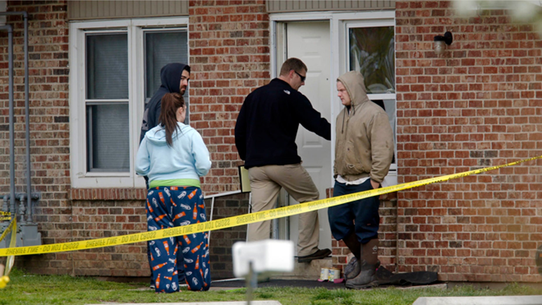 April 24: Police investigate the scene at a house in Manchester where five people were found killed. The suspect, who was not immediately identified by police, died at a hospital after a shootout with police.