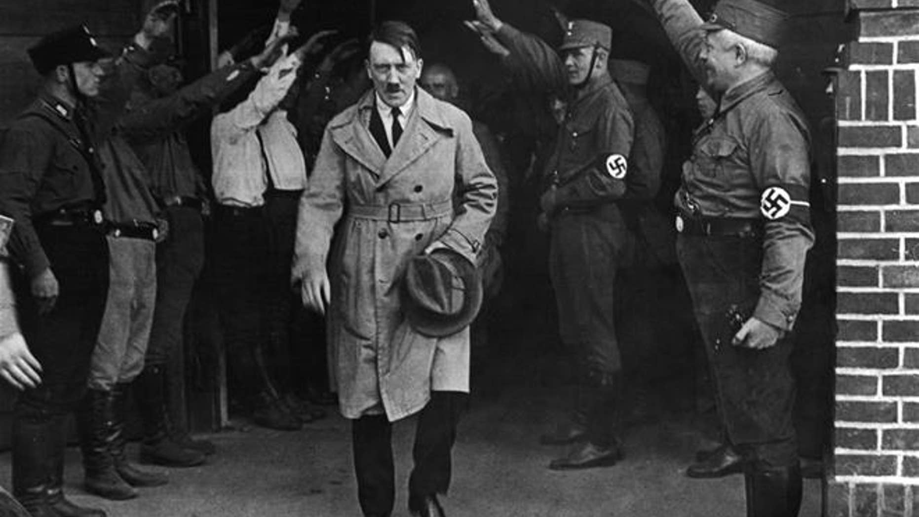 Adolf Hitler, leader of the National Socialists, emerges from the party's Munich headquarters.