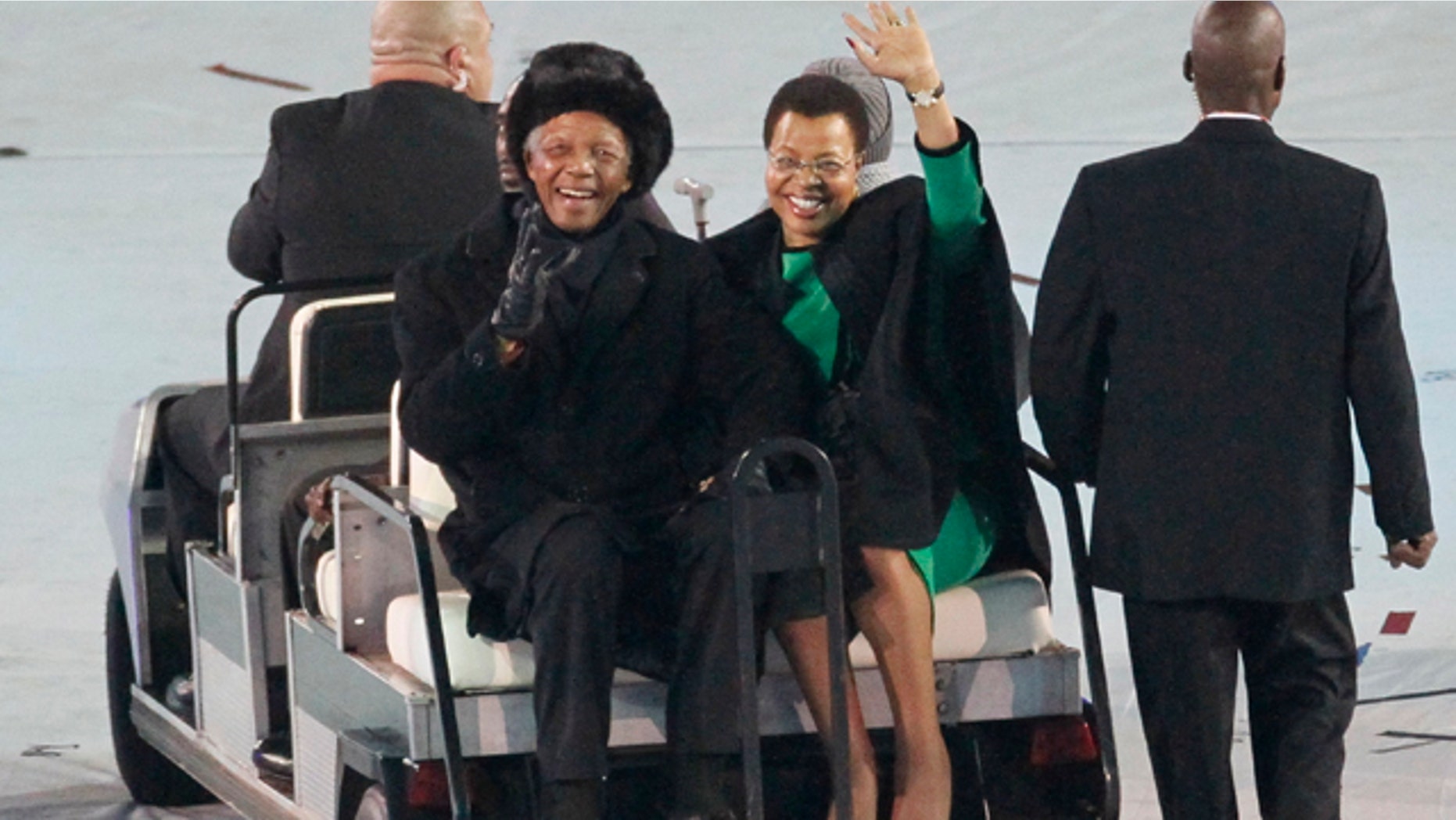July 11: Former South African President Nelson Mandela waves to the crowd at the World Cup closing ceremonies. (AP)