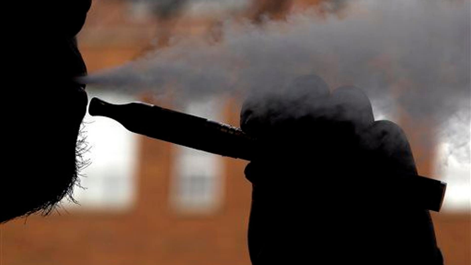 File photo of an e-cig smoker.