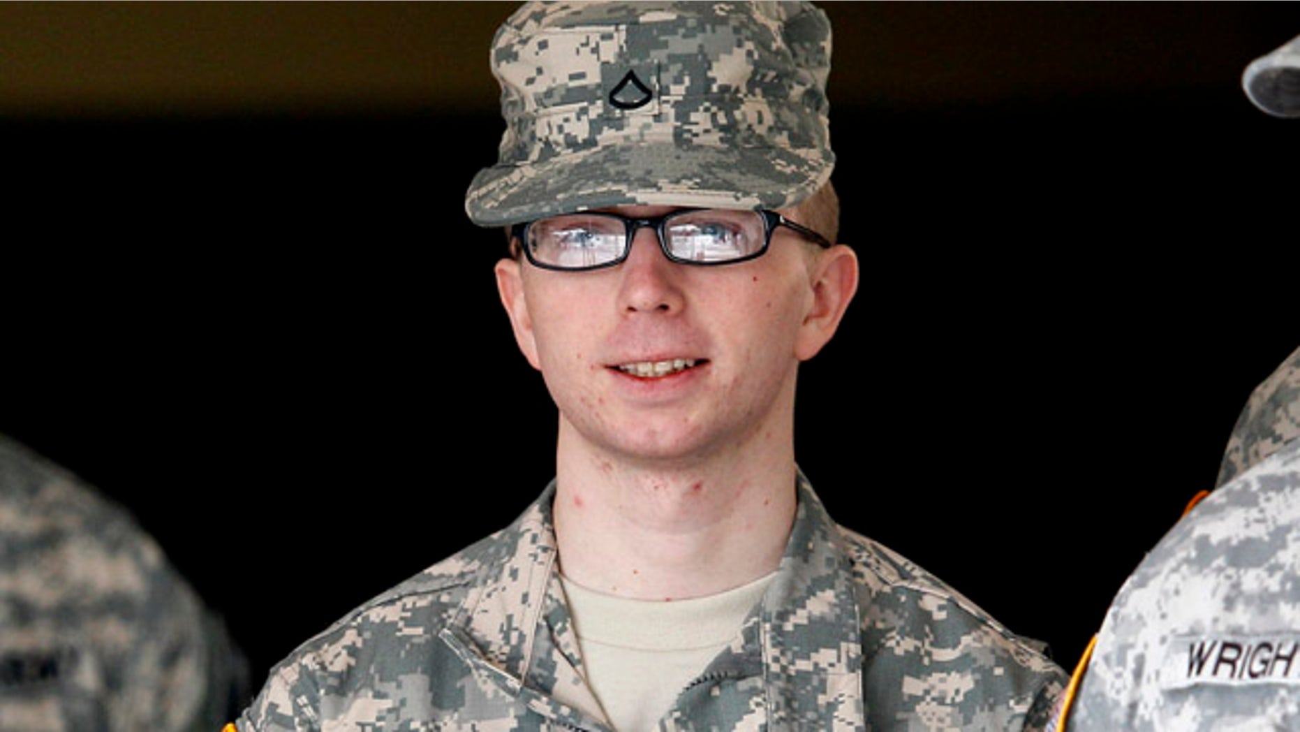 Dec. 22, 2011: Army Pfc. Bradley Manning is escorted from a courthouse in Fort Meade, Md.