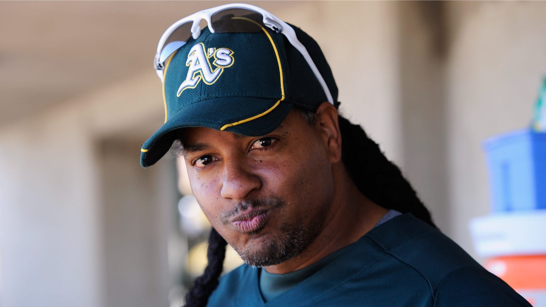 PHOENIX, AZ - MARCH 10: Manny Ramirez #1 of the Oakland Athletics before the start of a spring training baseball game against the Cincinnati Reds at the Phoenix Municipal Stadium on March 10, 2012 in Phoenix, Arizona. (Photo by Kevork Djansezian/Getty Images)