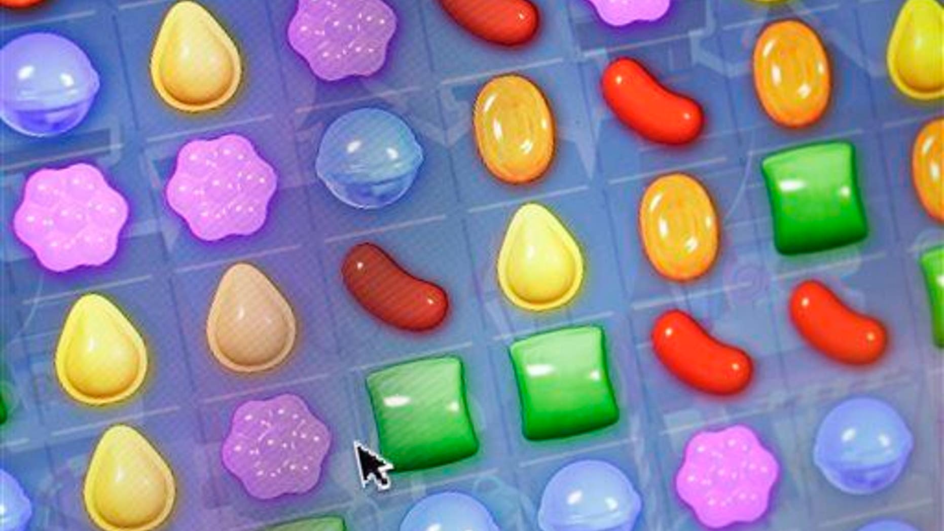 In this March 24, 2014, file photo, a detail from King Digital Entertainment's online game "Candy Crush Saga" is shown.