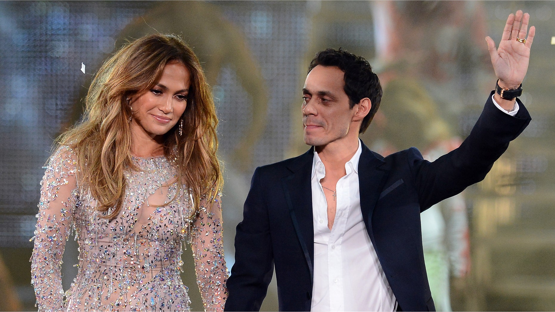 LAS VEGAS, NV - MAY 26: Singer/actress Jennifer Lopez (L) and singer Marc Anthony appear during the finale of the Q'Viva! The Chosen Live show at the Mandalay Bay Events Center on May 26, 2012 in Las Vegas, Nevada. (Photo by Ethan Miller/Getty Images)
