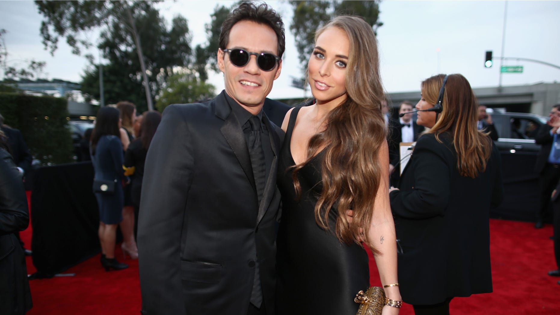LOS ANGELES, CA - JANUARY 26: Singer Marc Anthony (L) and TV personality Chloe Green attend the 56th GRAMMY Awards at Staples Center on January 26, 2014 in Los Angeles, California. (Photo by Christopher Polk/Getty Images for NARAS)