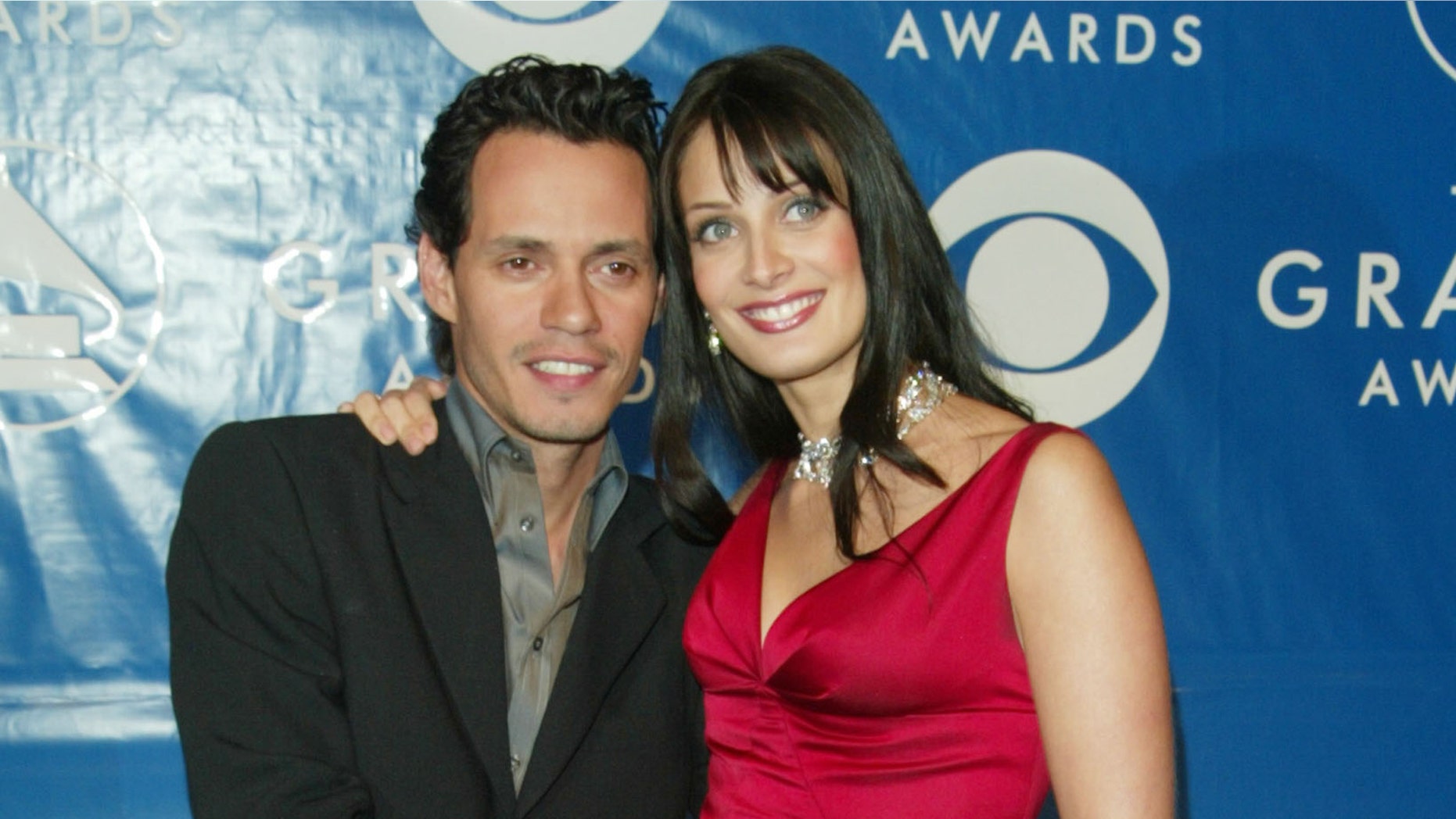 NEW YORK - FEBRUARY 23: Marc Anthony and his wife Dayanara Torres attend the 45th Annual Grammy Awards at Madison Square Garden on February 23, 2003 in New York City. (Photo by Evan Agostini/Getty Images)