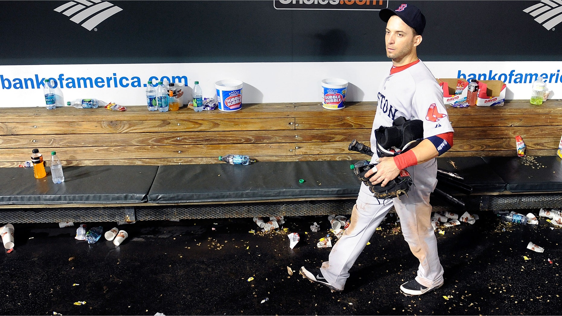 BALTIMORE, MD - SEPTEMBER 28: Marco Scutaro #10 of the Boston Red Sox walks in the dugout after a 4-3 loss against the Baltimore Orioles at Oriole Park at Camden Yards on September 28, 2011 in Baltimore, Maryland. (Photo by Greg Fiume/Getty Images)