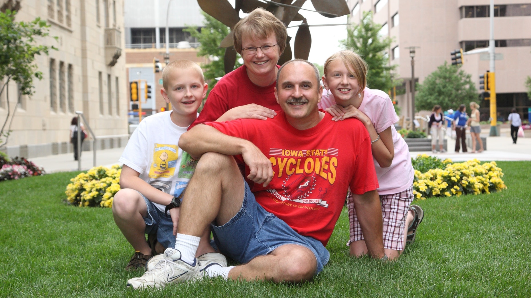 Haley Dostalik, her mother, Kari; her father, Marty; and her brother, Adam.