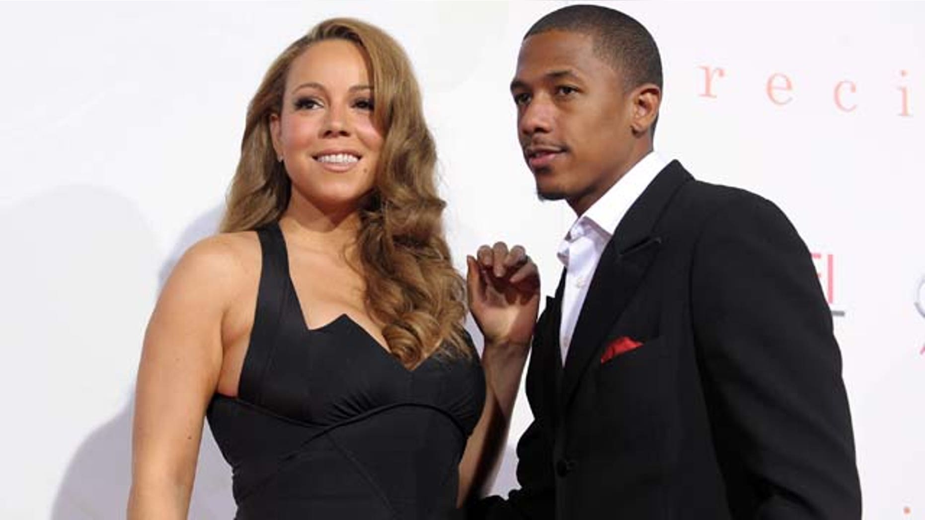 HOLLYWOOD - NOVEMBER 01: Actress/singer Mariah Carey (L) and actor Nick Cannon arrive at the screening of "Precious: Based On The Novel 'PUSH' By Sapphire" during AFI FEST 2009 held at Grauman's Chinese Theatre on November 1, 2009 in Hollywood, California. (Photo by Kevin Winter/Getty Images for AFI)