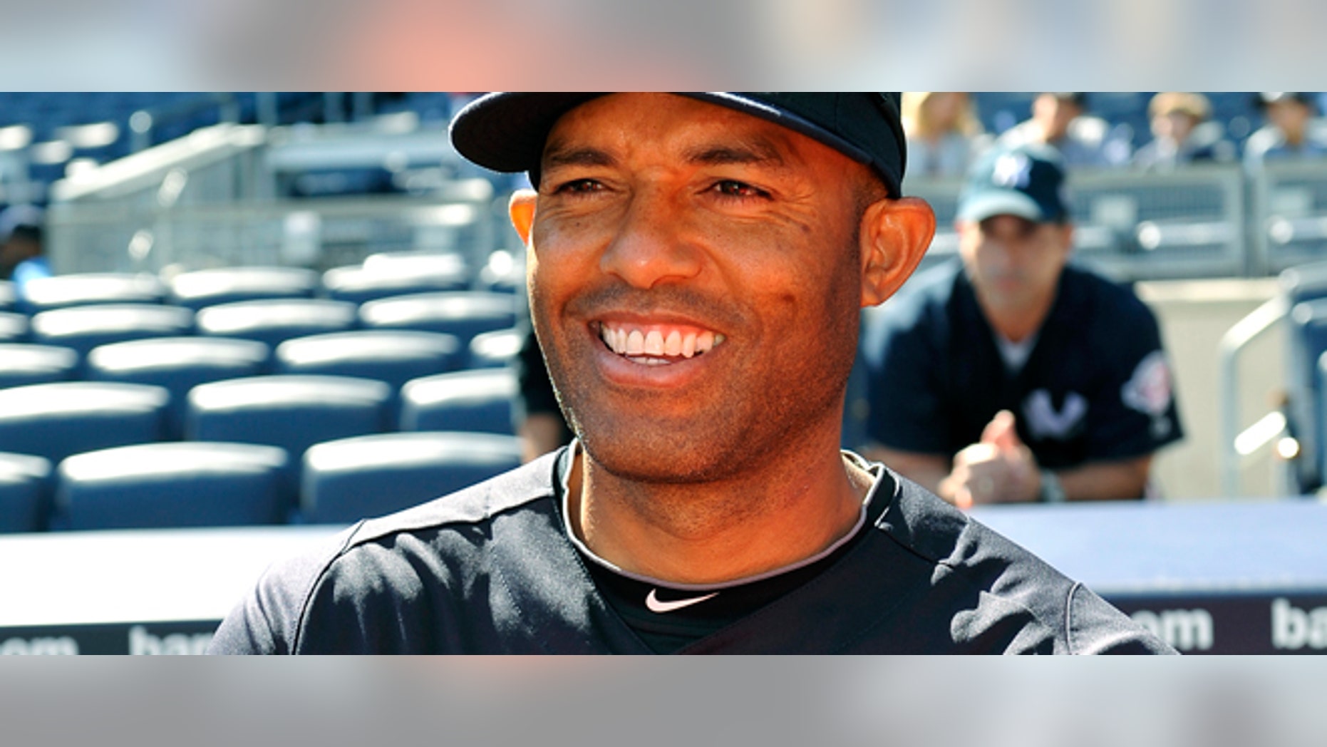 New York Yankees' Mariano Rivera smiles as he is interviewed during batting practice before a baseball game against the Minnesota Twins on Monday, Sept. 19, 2011, at Yankee Stadium in New York. Rivera is tied with Trevor Hoffman at 601 career saves. (AP Photo/Kathy Kmonicek)