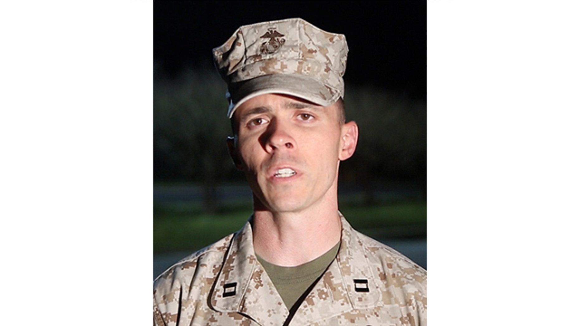 April 8, 2014: Capt. Joshua Smith, public affairs officer for Marine Corps Installations East, Camp Lejeune, Jacksonville, comments on the shooting at Camp Lejeune. A Marine posted at the main gate of the North Carolina base shot and killed a colleague inside a guard shack, a military spokesman said. (AP Photo/John Althouse/The Daily News)