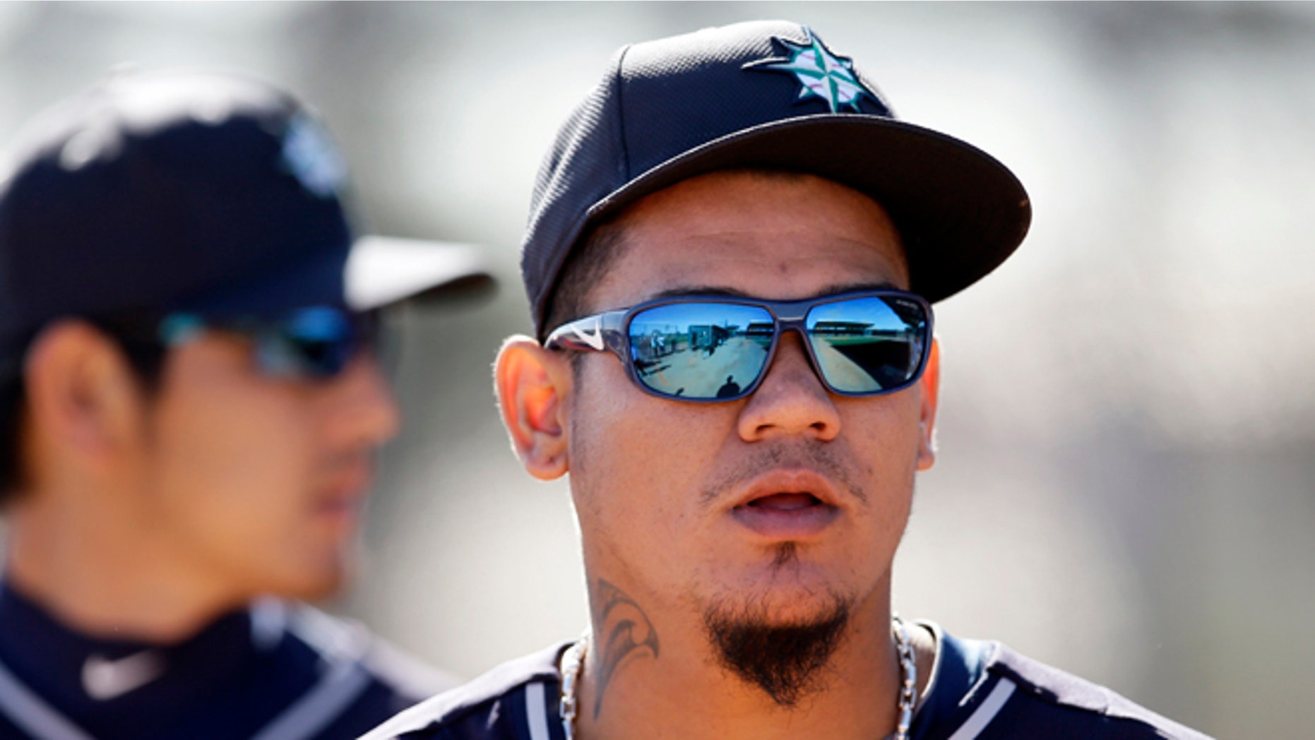 Seattle Mariners' Felix Hernandez walks out of the bullpen after a throwing session during spring training baseball practice, Thursday Feb. 20, 2014, in Peoria, Ariz. (AP Photo/Tony Gutierrez)