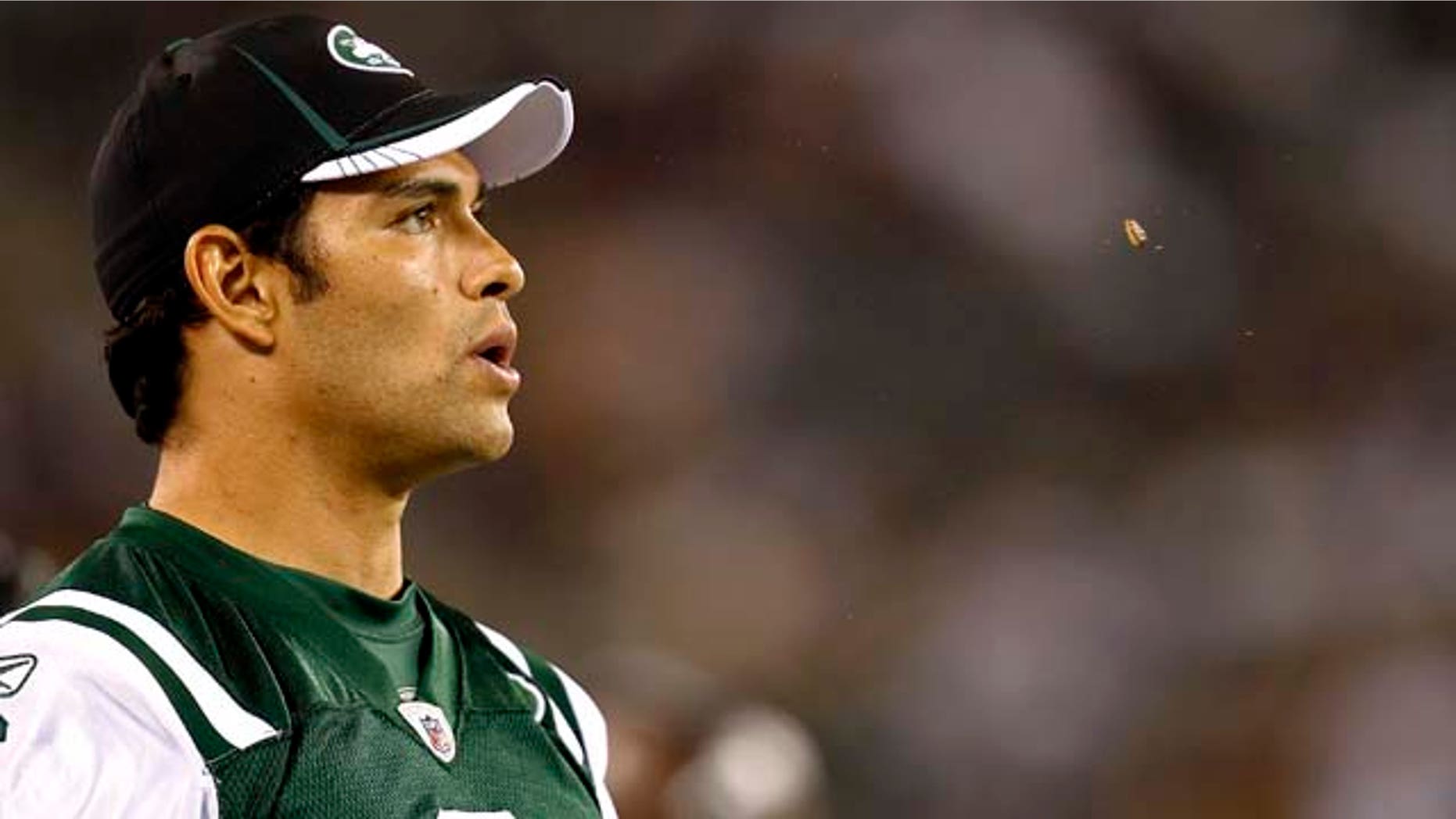 EAST RUTHERFORD, NJ - SEPTEMBER 01: Mark Sanchez #6 of the New York Jets spits out a sunflower seed during their pre-season game at MetLife Stadium on September 1, 2011 in East Rutherford, New Jersey. (Photo by Jeff Zelevansky/Getty Images)
