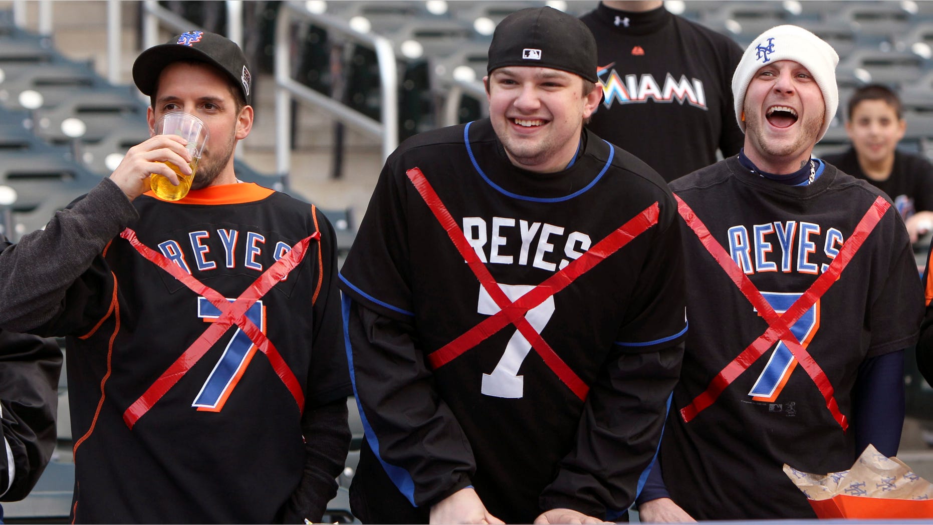 New York Mets fans heckle Miami Marlins' Jose Reyes, previously a Met, before a baseball game on Tuesday, April 24, 2012, at Citi Field in New York. (AP Photo/Seth Wenig)