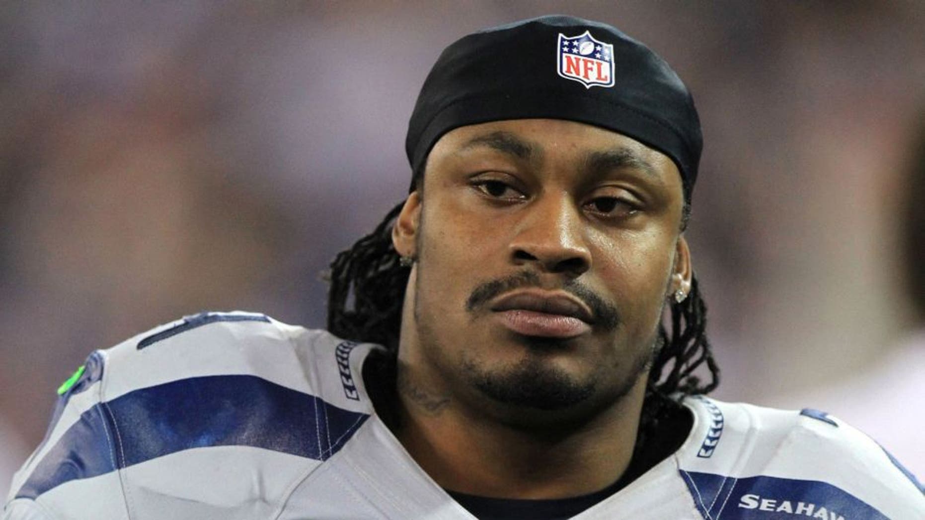 Dec 16, 2012; Toronto, Ontario, Canada; Seattle Seahawks running back Marshawn Lynch (24) on the sideline against the Buffalo Bills during the second half at the Rogers Centre. Seahawks beat the Bills 50-17. Mandatory Credit: Kevin Hoffman-USA TODAY Sports