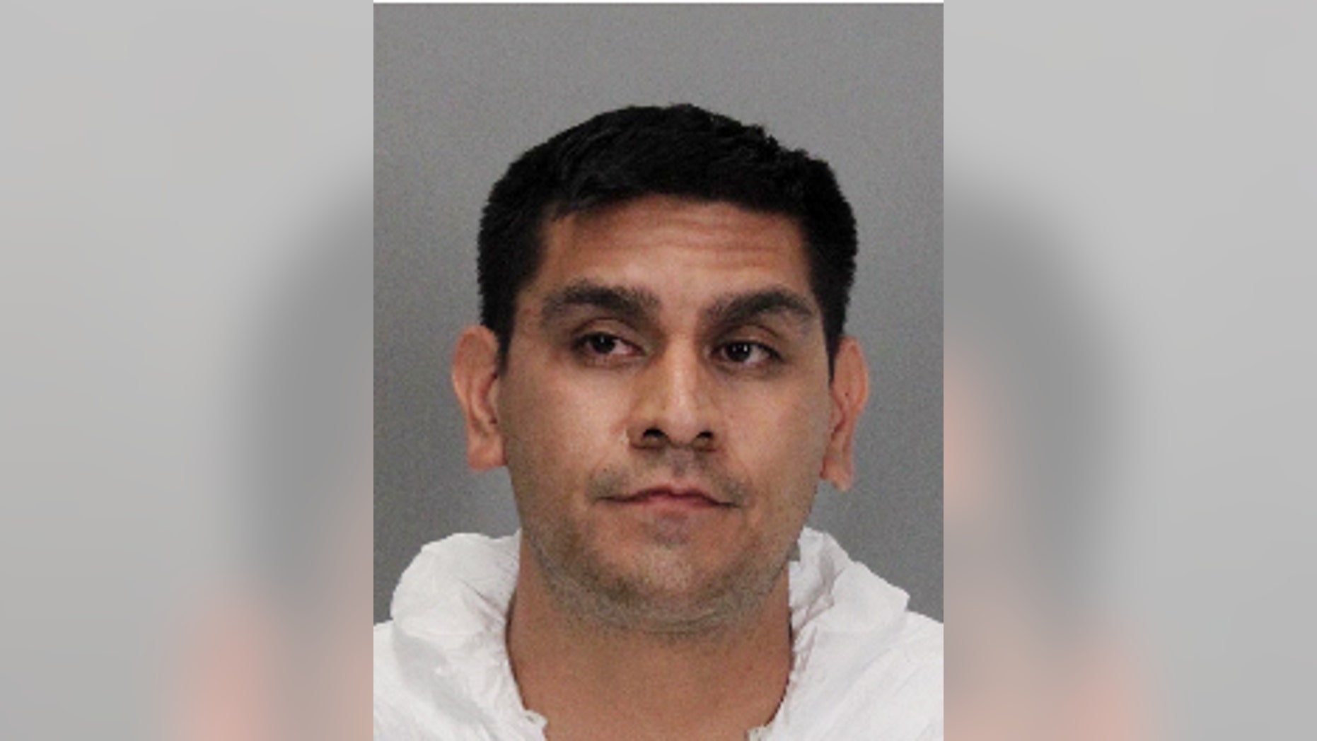 This Sunday, July 19, 2015 booking image released by the Santa Clara County Sheriff's Department shows Martin Martinez. Martinez was arrested on Sunday in San Jose, Calif., for the murders of two women and three children in Modesto, Calif., on Saturday. (Santa Clara Sheriff's Department via AP)