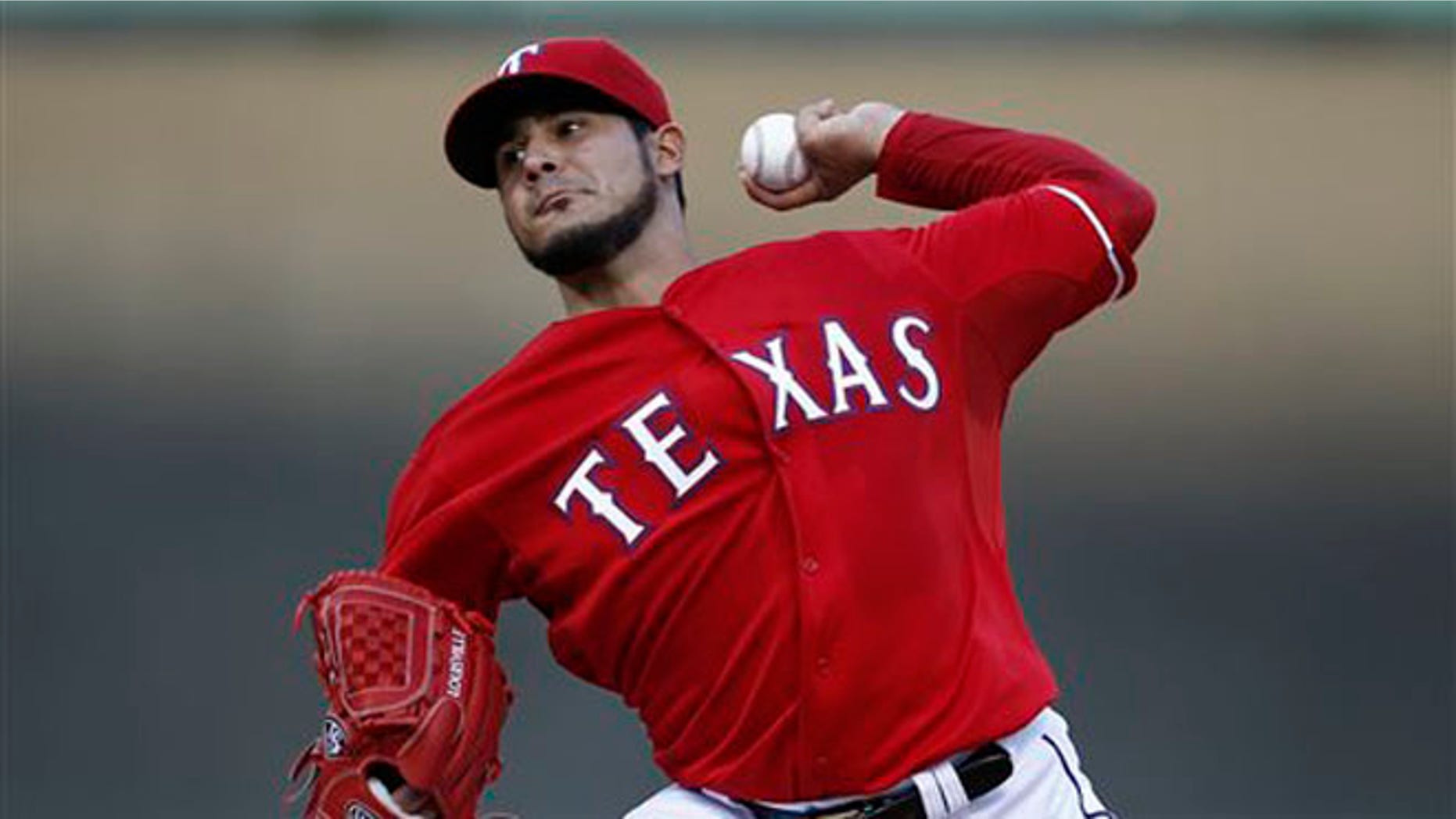Texas Rangers starting pitcher Martin Perez throws to the Boston Red Sox during the first inning of a baseball game on Saturday, May 10, 2014, in Arlington, Texas. (AP Photo/Jim Cowsert)