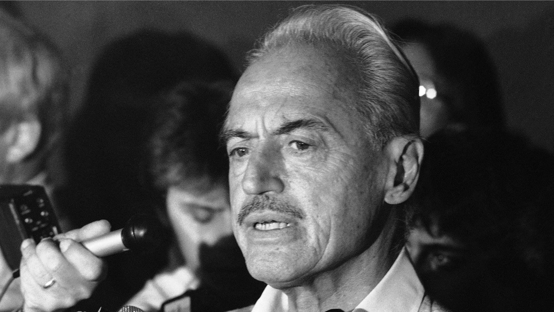 This July 16, 1981 file photo shows baseball union leader Marvin Miller speaking to reporters after rejecting a proposal to end a baseball strike, in New York.