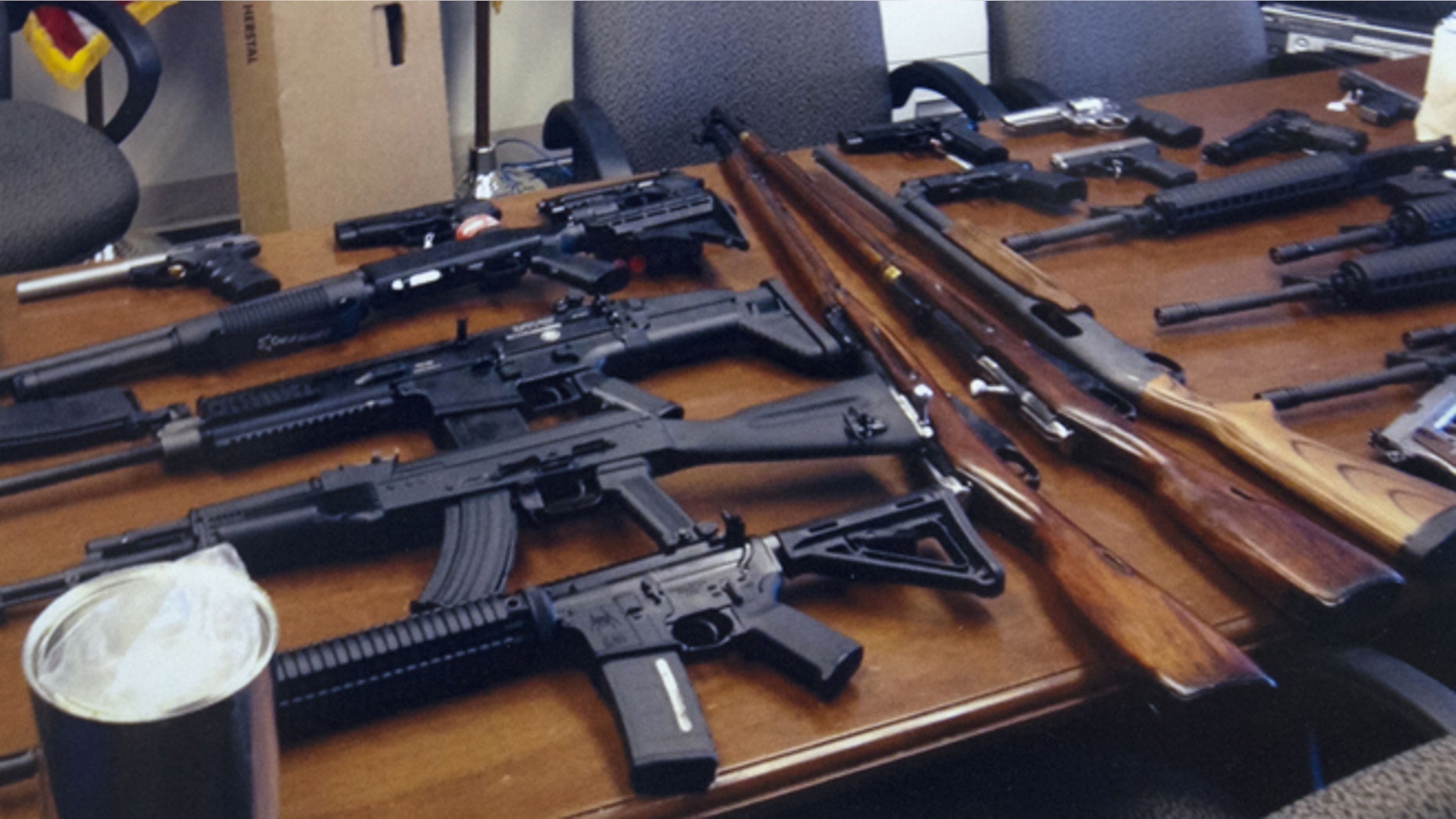 This undated handout photo provided by the Prince George's, Md. County Police shows weapons found in the possession of a suspect who they say was plotting a shooting in his workplace.