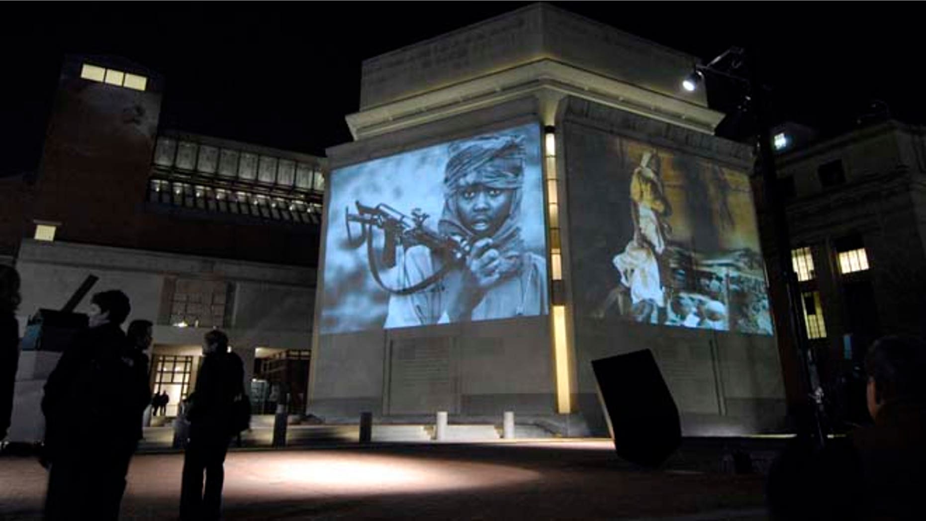 Nov. 20, 2006: Images from Darfur and Chad are projected on the exterior walls of the United States Holocaust Memorial Museum in Washington.