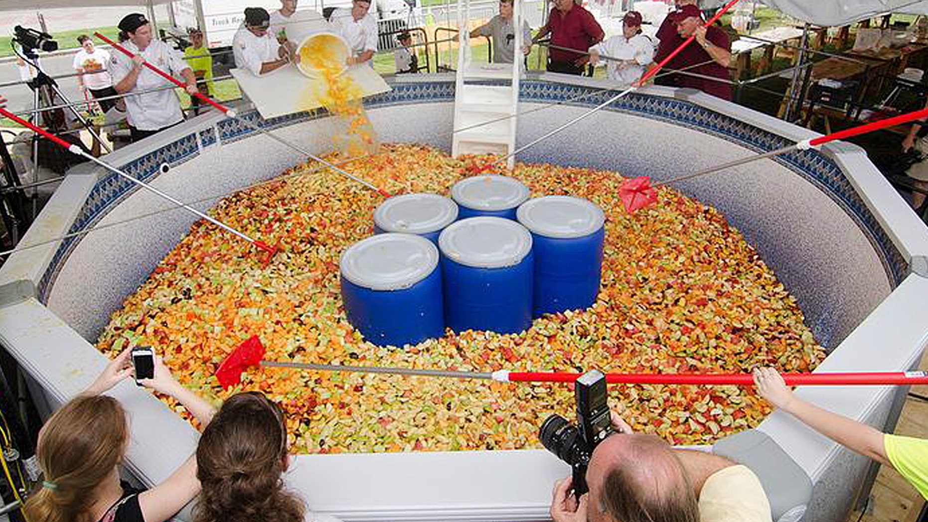 This Monday, Sept. 2, 2013 photo released on the University of Massachusetts, Amherst media relations website shows a fruit salad prepared on campus, and weighing more than 15,000 pounds. (AP Photo/University of Massachusetts, Amherst)