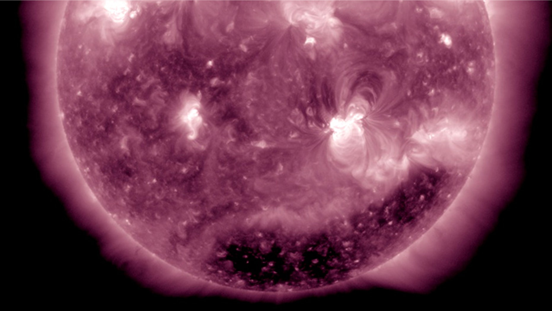 An X2.2 flare erupted from the sun's active region 1158 (at lower right) at about 0150 UT or 8:50 pm ET on February 14.