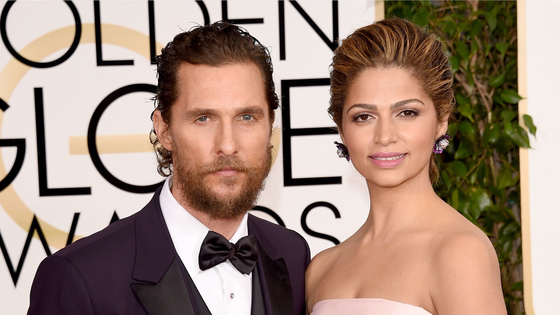 Matthew McConaughey and wife Camila Alves at the Golden Globe Awards on January 11, 2015 in Beverly Hills, California.