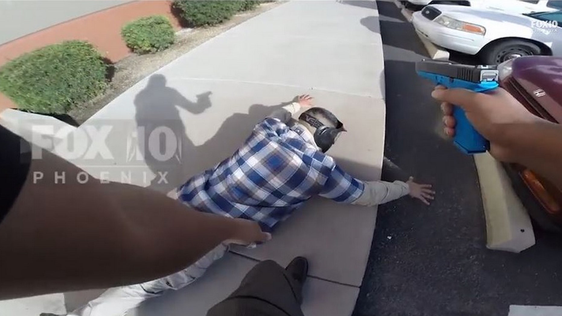 Body camera footage shows a lifelike police scenario the Rev. Jarrett Maupin's confronted during a recent training session (Fox10 Phoenix)