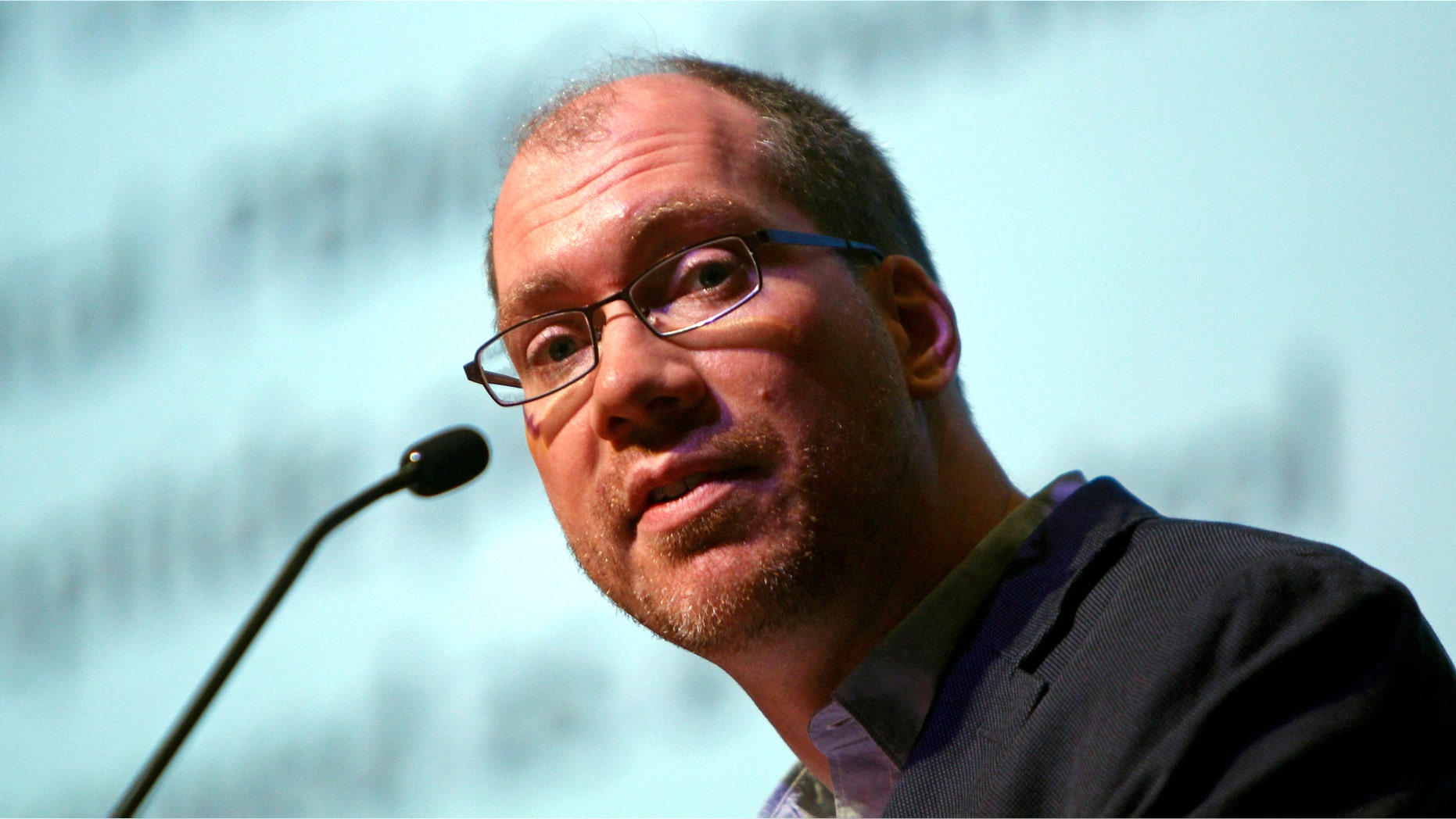 Timothy Henrich of the Harvard-affiliated Brigham and Women's Hospital in Boston speaks at the International AIDS Society Conference 2013 in Kuala Lumpur, Malaysia.