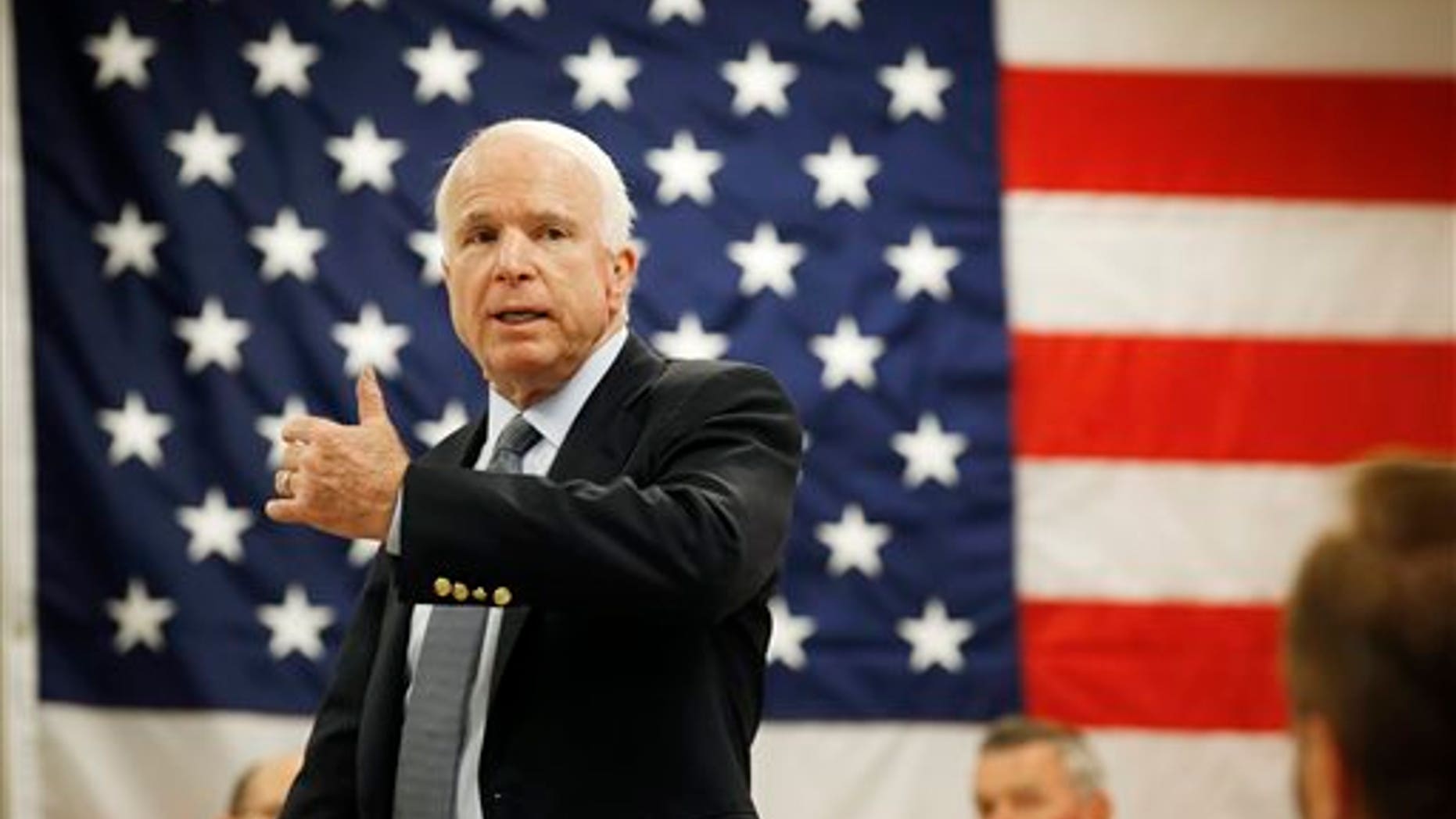 Tuesday, June 30, Sen. John McCain, R-Ariz., speaks with employees at Robertson Fuel Systems, in Tempe, Arizona.