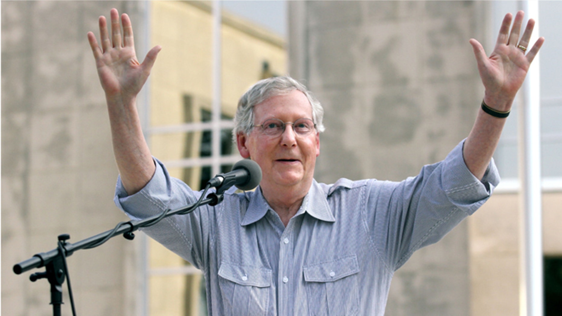 In this Tuesday, Aug. 26, 2014 photo, Senate Minority Leader Mitch McConnell, R-Ky, speaks on the Davies County Courthouse lawn in Owensboro, Ky.,
