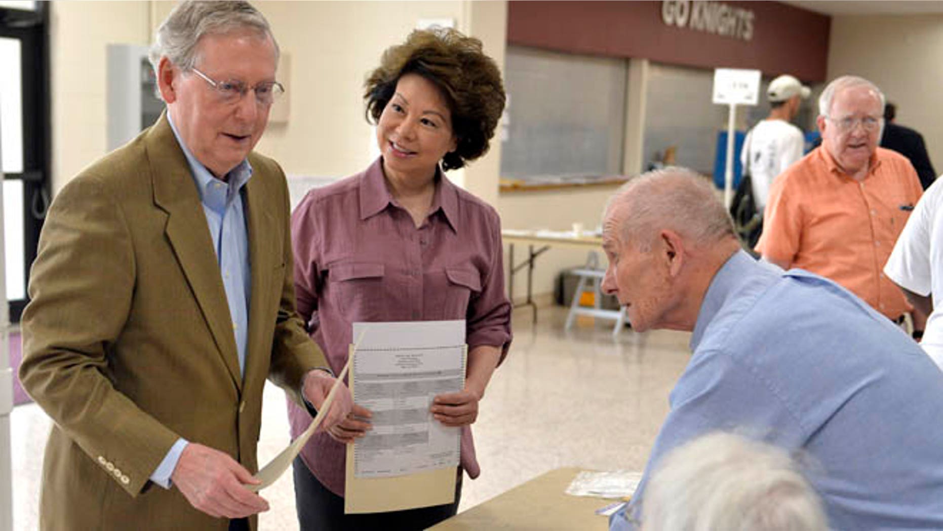 May 20, 2014: Kentucky Republican Senator Mitch McConnell and wife Elaine Chao at a polling station at Bellarmine University, in Louisville, Ky.