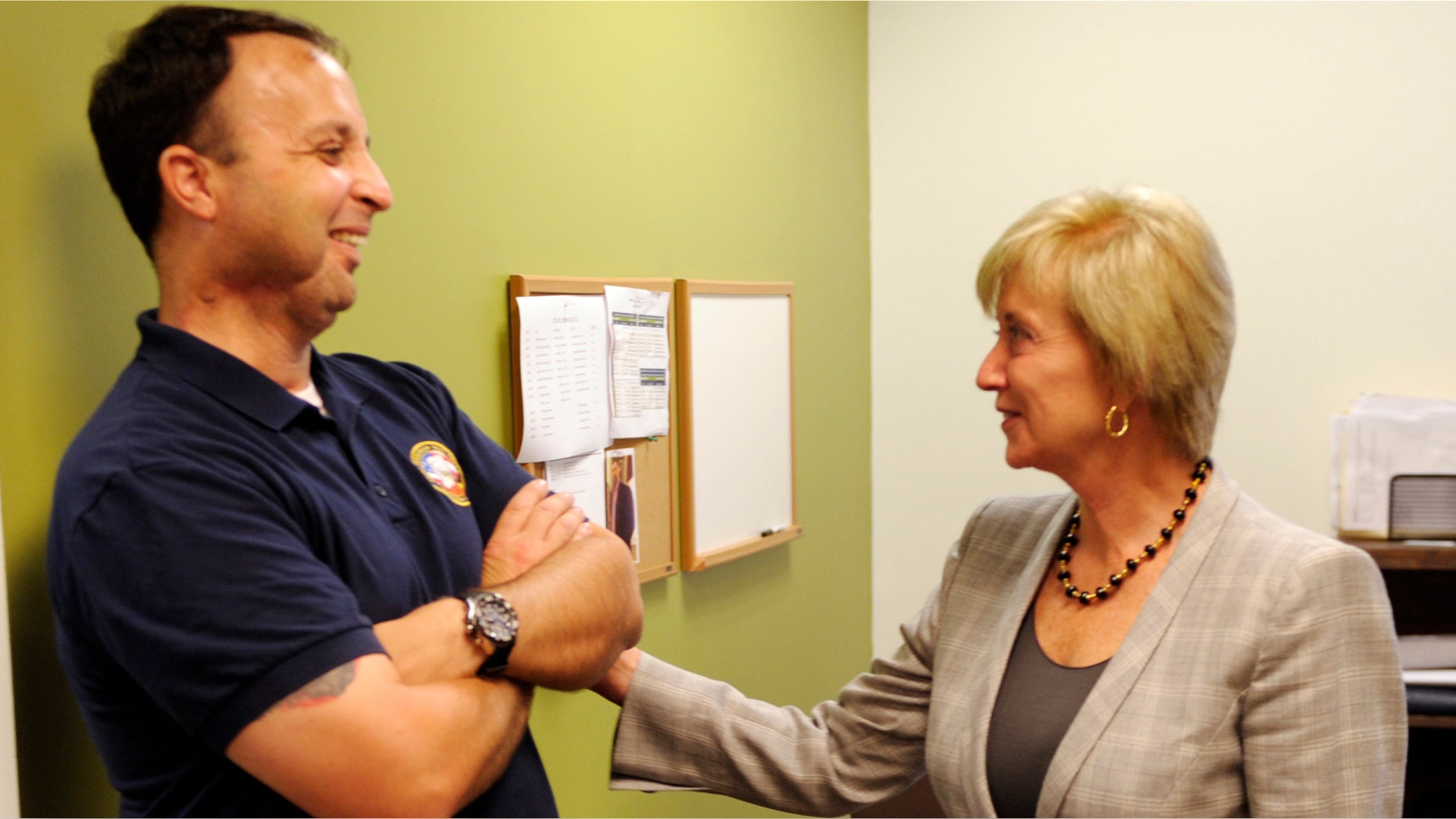 FILE: Sept. 5, 2012: Linda McMahon, a Republican in Connecticut running for a Senate seat, greets Iraq veteran Terry Rathbun in Groton, Conn.