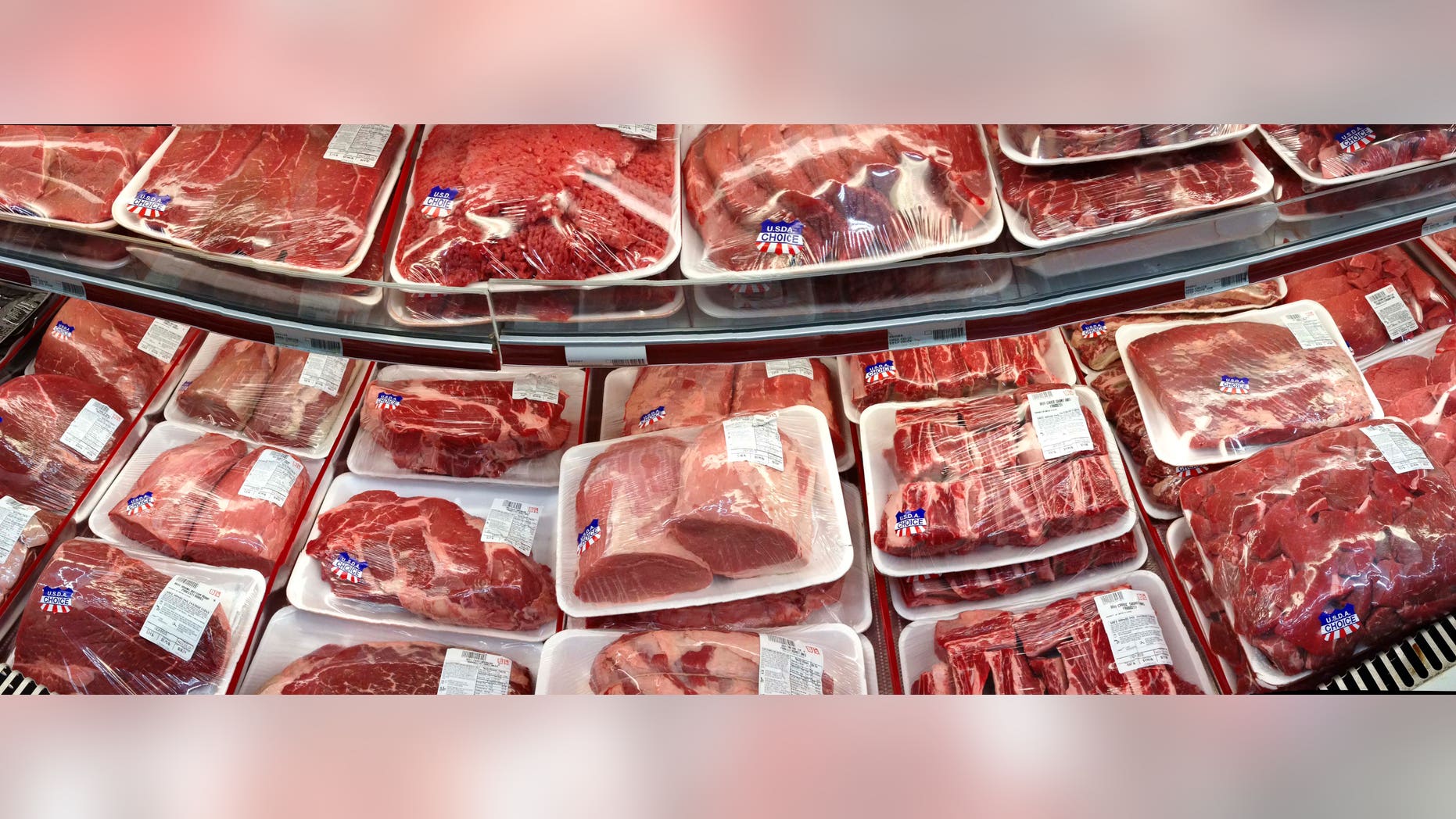 FILE - In this Nov. 2, 2013 file photo, various cuts of beef and port are displayed for sale in the meat department at a discount market in Arlington, Va. Cattle groups from the U.S. and Canada are upset that a new Farm Bill passed by the House on Wednesday, Jan. 29, 2014, fails to make changes to country-of-origin labeling requirements. The rules require detailed labels about the origins of beef, pork and chicken sold in U.S. stores. (AP Photo/J. Scott Applewhite, File)