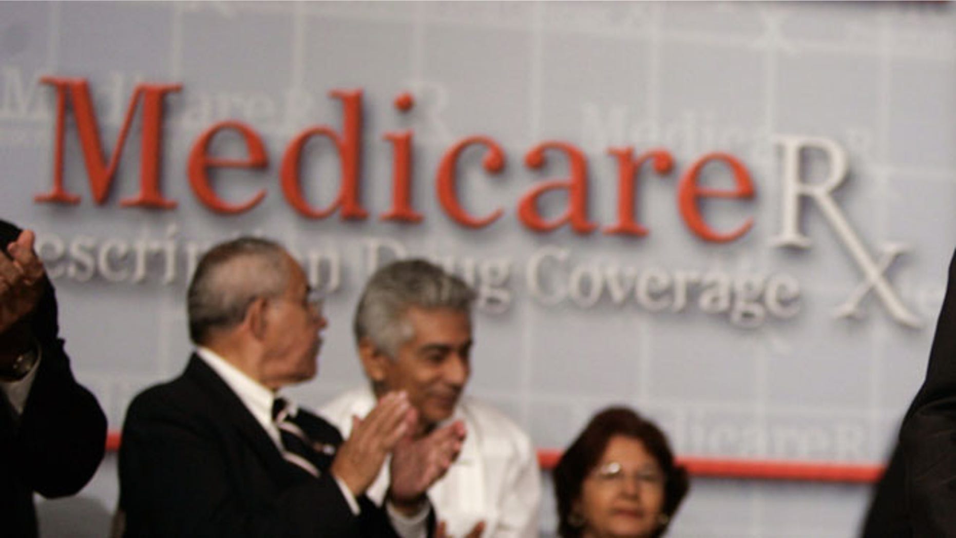 FILE: Attendees of a 2006 conversation on the Medicare Prescription Drug Benefit at the Asociacion Borinquena de Florida Central in Orlando, Fla.