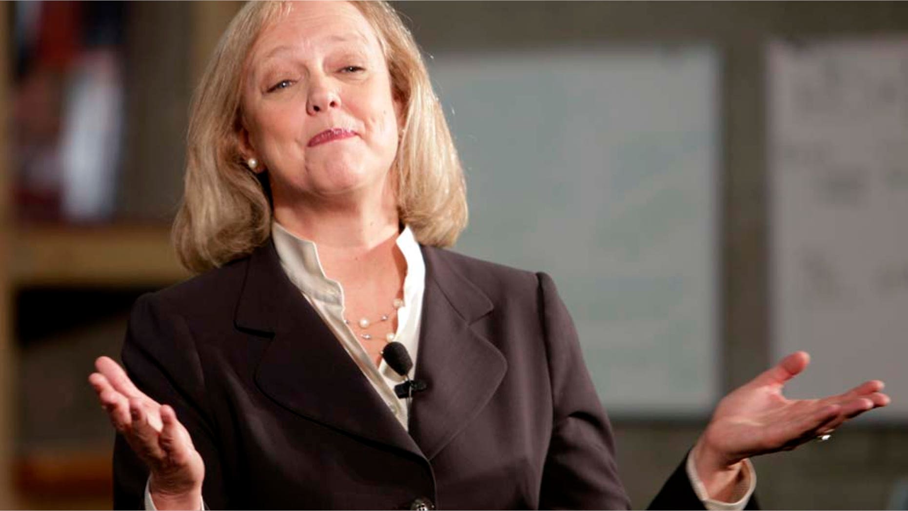 California gubernatorial candidate Meg Whitman makes a point while speaking to the media at a campaign stop at Sneakskicks Wednesday, Oct. 27, 2010, in San Diego. (AP Photo/Lenny Ignelzi)