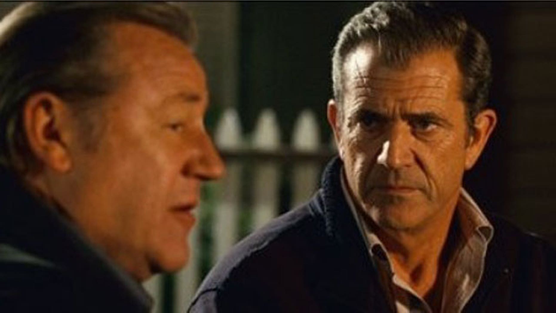 In this film publicity image released by Warner Bros.,Ray Winstone, left, and Mel Gibson are shown in a scene from, 'Edge of Darkness.'