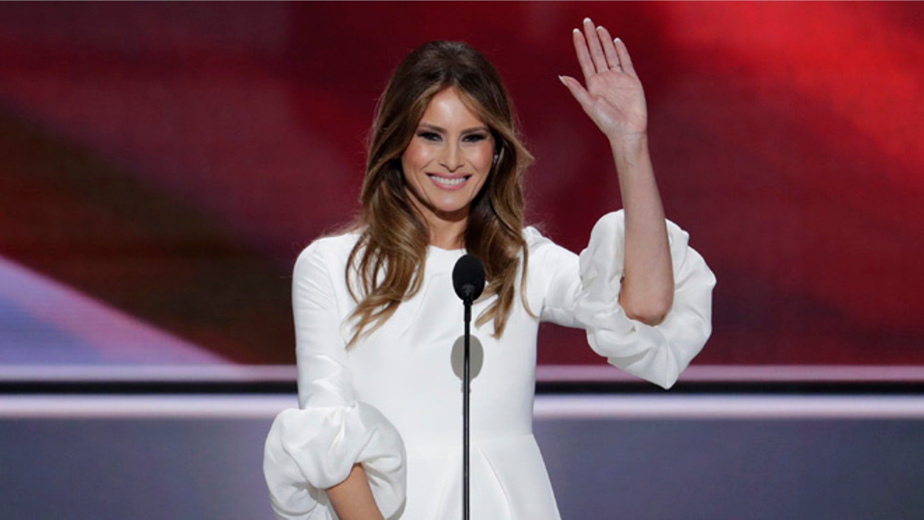 Melania Trump, wife of Republican Presidential Candidate Donald Trump waves as she speaks during the opening day of the Republican National Convention in Cleveland, Monday, July 18, 2016. (AP Photo/J. Scott Applewhite)